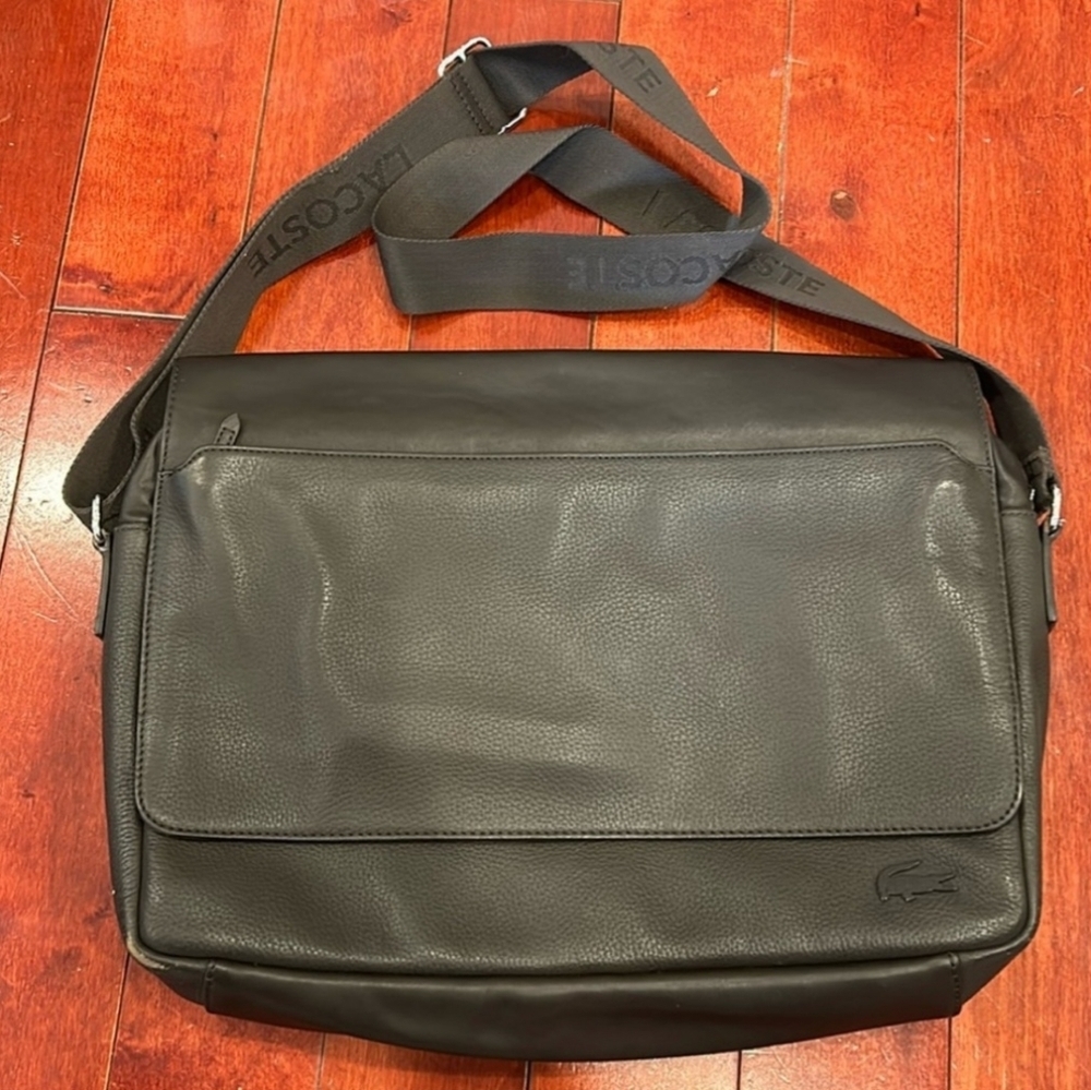 Super high class brown pebbled leather lacoste messenger bag.